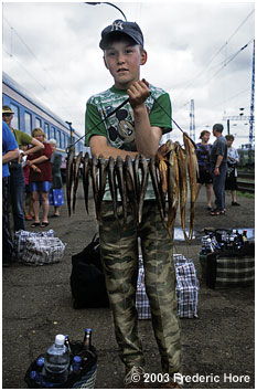 Care for some smoked fish? Trackside merchants on the Trans Siberian